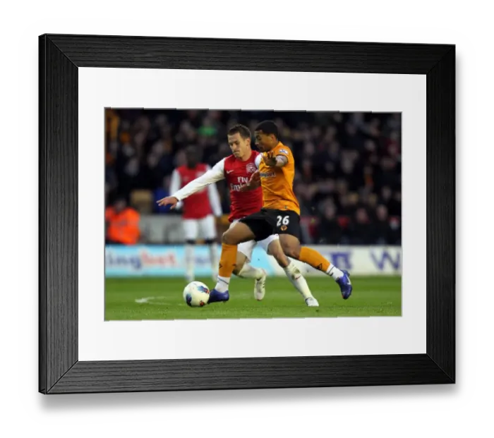 Framed Print : Wolverhampton Wanderers vs. Arsenal: A Premier League Showdown - Davis vs. Ramsey