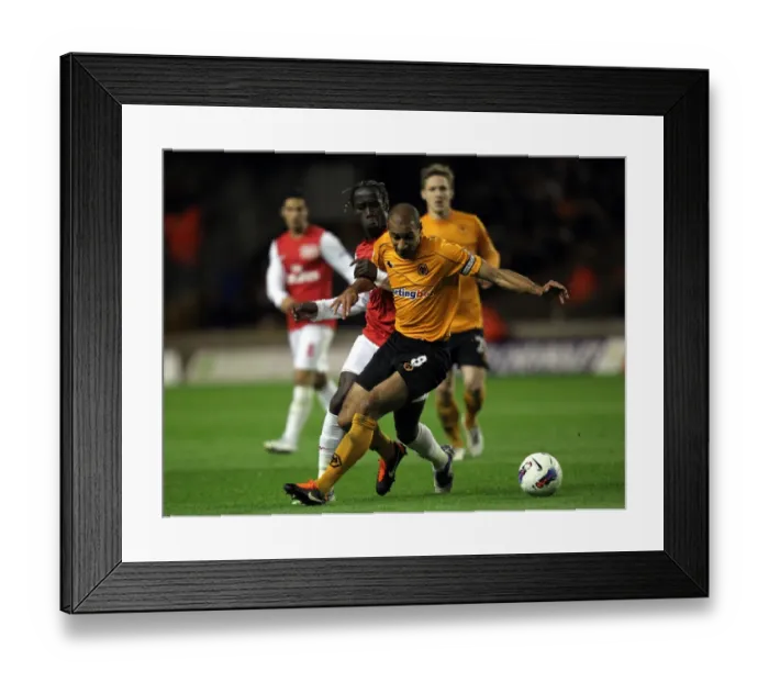 Framed Print : Wolverhampton Wanderers vs. Arsenal: Henry vs. Sagna's Intense Clash - A Premier League Showdown Framed Print : Wolverhampton Wanderers vs. Arsenal: Henry vs. Sagna's Intense Clash - A Premier League Showdown