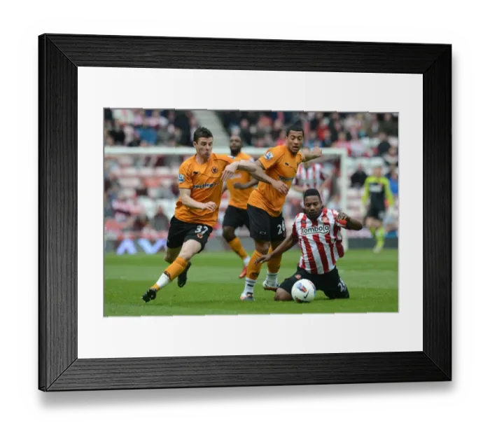 Framed Print : Intense Clash: Sessegnon vs. Davis at Stadium of Light - Wolverhampton Wanderers vs. Sunderland, Premier League