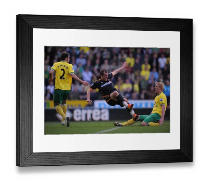 Framed Print : Wolverhampton Wanderers vs. Norwich City: Milijas Fouls Whitbread in Intense Barclays Premier League Clash Framed Print : Wolverhampton Wanderers vs. Norwich City: Milijas Fouls Whitbread in Intense Barclays Premier League Clash
