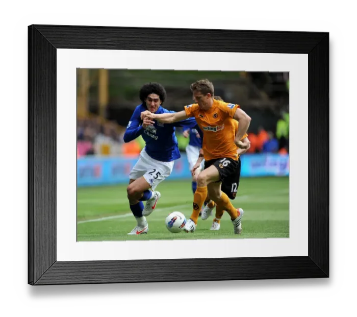 Framed Print : Fellaini vs Berra: A Football Rivalry's Intense Battle for Ball Supremacy - Wolverhampton Wanderers vs Everton Framed Print : Fellaini vs Berra: A Football Rivalry's Intense Battle for Ball Supremacy - Wolverhampton Wanderers vs Everton