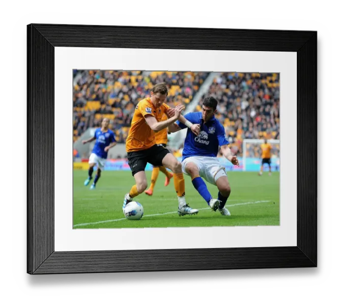 Framed Print : Intense Battle for the Ball: Wolverhampton Wanderers vs. Everton - Barclays Premier League, Molineux Stadium Framed Print : Intense Battle for the Ball: Wolverhampton Wanderers vs. Everton - Barclays Premier League, Molineux Stadium
