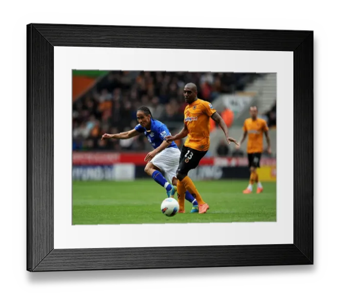 Framed Print : Battle at Molineux: Pienaar vs Zubar - Premier League Clash between Everton and Wolverhampton Wanderers Framed Print : Battle at Molineux: Pienaar vs Zubar - Premier League Clash between Everton and Wolverhampton Wanderers