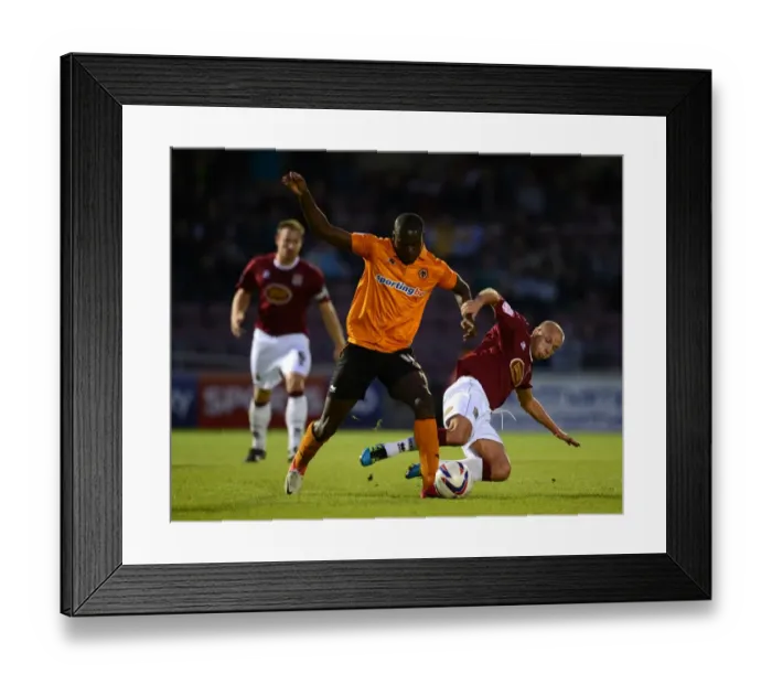 Framed Print : Guttridge vs Nouble: A Battle in the Capital One Cup Clash between Northampton Town and Wolverhampton Wanderers