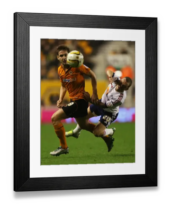 Framed Print : Championship Showdown: Wolverhampton Wanderers vs. Bolton Wanderers - A Battle of Titans: Kevin Doyle vs. Jay Spearing Framed Print : Championship Showdown: Wolverhampton Wanderers vs. Bolton Wanderers - A Battle of Titans: Kevin Doyle vs. Jay Spearing