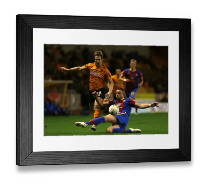 Framed Print : Wolverhampton Wanderers Kevin Doyle Dodges Challenge from Crystal Palace's Damien Delaney in Championship Showdown at Molineux