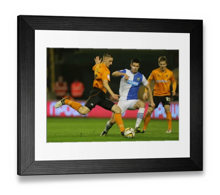 Framed Print : Tense Moment: Jake Cassidy's Goal Attempt Thwarted by Scott Dann (Wolverhampton Wanderers vs. Blackburn Rovers) Framed Print : Tense Moment: Jake Cassidy's Goal Attempt Thwarted by Scott Dann (Wolverhampton Wanderers vs. Blackburn Rovers)
