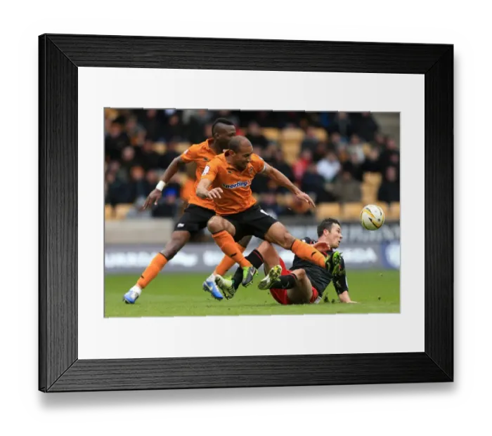 Framed Print : Henry vs. Cowie: Intense Rivalry in Wolverhampton Wanderers vs. Cardiff City Npower Championship Clash (24-02-2013) Framed Print : Henry vs. Cowie: Intense Rivalry in Wolverhampton Wanderers vs. Cardiff City Npower Championship Clash (24-02-2013)