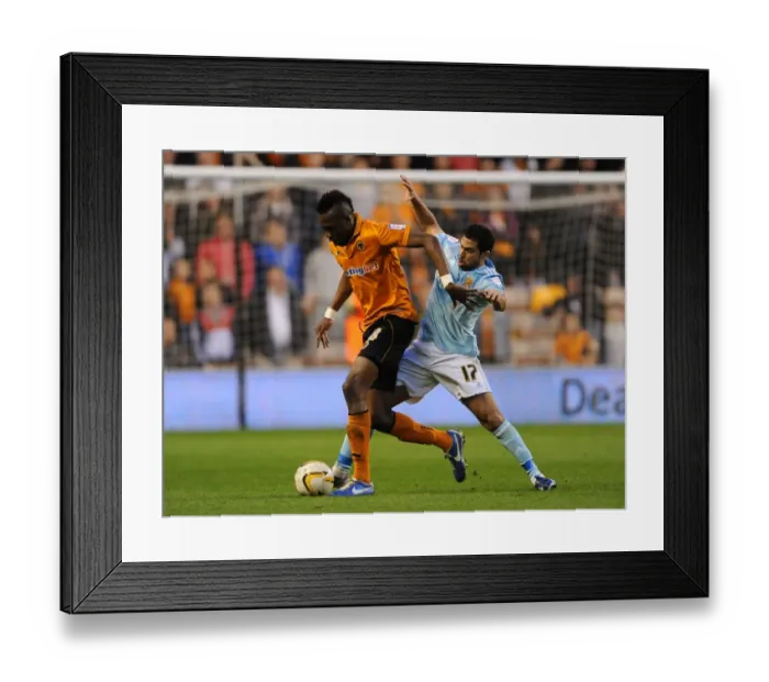Framed Print : Championship Showdown: Tongo Doumbia vs Ahmed Fathi - A Battle for Supremacy at Molineux Framed Print : Championship Showdown: Tongo Doumbia vs Ahmed Fathi - A Battle for Supremacy at Molineux