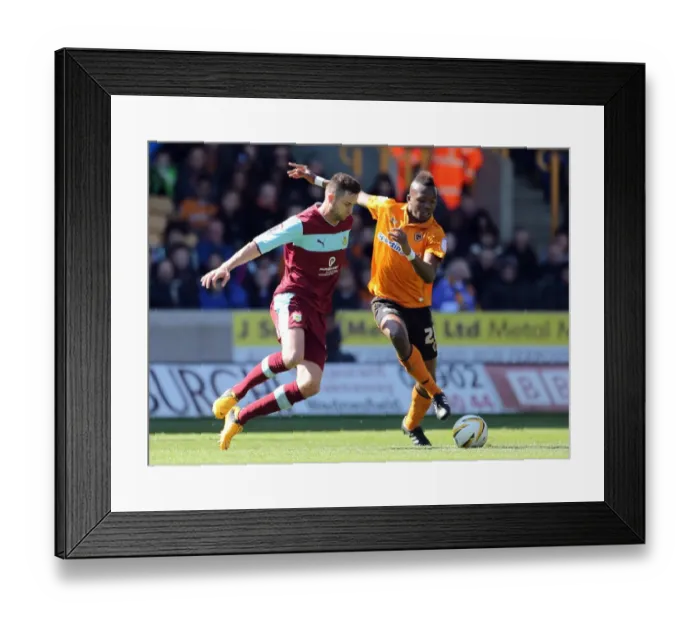 Framed Print : Championship Showdown: A Fight for Supremacy - Tongo Doumbia vs. David Edgar (Wolverhampton Wanderers vs. Burnley) Framed Print : Championship Showdown: A Fight for Supremacy - Tongo Doumbia vs. David Edgar (Wolverhampton Wanderers vs. Burnley)