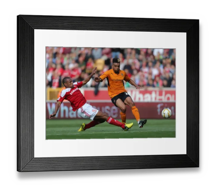 Framed Print : Fierce Rivalry: Golbourne vs Thompson Clash in Wolverhampton Wanderers vs Swindon Town's Sky Bet League One Battle at Molineux Framed Print : Fierce Rivalry: Golbourne vs Thompson Clash in Wolverhampton Wanderers vs Swindon Town's Sky Bet League One Battle at Molineux