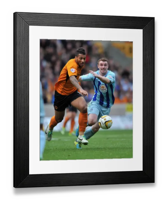 Framed Print : Intense Rivalry: Davis vs Fleck Battle for Ball in Wolves vs Coventry Sky Bet League 1 Clash (October 19, 2013)