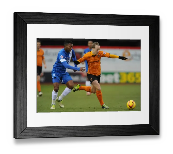 Framed Print : Intense Rivalry: Griffiths vs Nthle Battle in Wolverhampton Wanderers vs Peterborough United (Sky Bet League One)