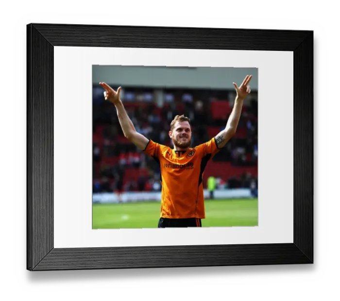 Framed Print : Richard Stearman's Triumphant Celebration: Wolverhampton Wanderers Claim Sky Bet League One Victory over Leyton Orient