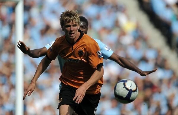 Andy Keogh at Manchester City: A Determined Moment from Wolves' Premier League Clash (22 / 8 / 09)