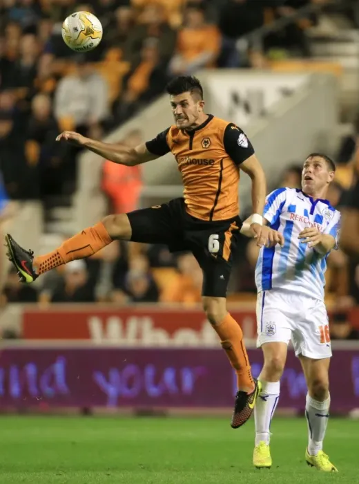 Framed Print : Batth's Dominance: Wolves vs Huddersfield Town - Championship Showdown at Molineux (Danny Batth Outjumps Grant Holt) Framed Print : Batth's Dominance: Wolves vs Huddersfield Town - Championship Showdown at Molineux (Danny Batth Outjumps Grant Holt)