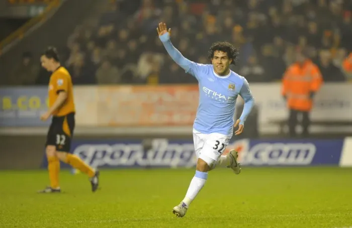 Framed Print : Carlos Tevez's Goal Celebration: Manchester City Takes the Lead over Wolverhampton Wanderers in Premier League Soccer Match Framed Print : Carlos Tevez's Goal Celebration: Manchester City Takes the Lead over Wolverhampton Wanderers in Premier League Soccer Match