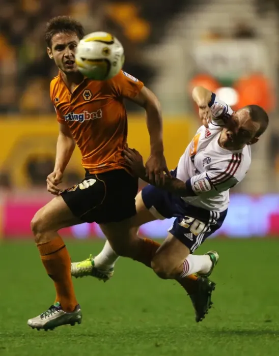 Framed Print : Championship Showdown: Wolverhampton Wanderers vs. Bolton Wanderers - A Battle of Titans: Kevin Doyle vs. Jay Spearing Framed Print : Championship Showdown: Wolverhampton Wanderers vs. Bolton Wanderers - A Battle of Titans: Kevin Doyle vs. Jay Spearing