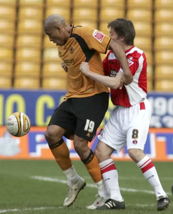 Framed Print : Chris Iwelumo vs Matt Holland: A Championship Battle at Molineux (March 14, 2009)