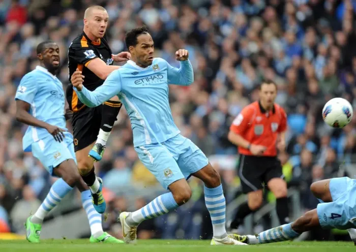 Framed Print : A Clash of Football Titans: Jamie O'Hara vs. Joleon Lescott - Manchester City vs. Wolverhampton Wanderers Framed Print : A Clash of Football Titans: Jamie O'Hara vs. Joleon Lescott - Manchester City vs. Wolverhampton Wanderers