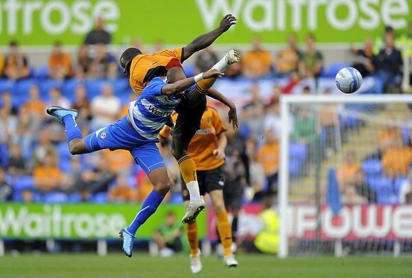 Clash of Forces: Jimmy Kebe vs. George Elokobi in the Reading vs. Wolverhampton Wanderers Pre-Season Friendly
