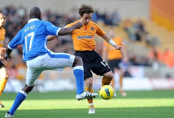 Clash between Hunt and Boyce: Wolverhampton Wanderers vs. Wigan Athletic in Premier League Soccer