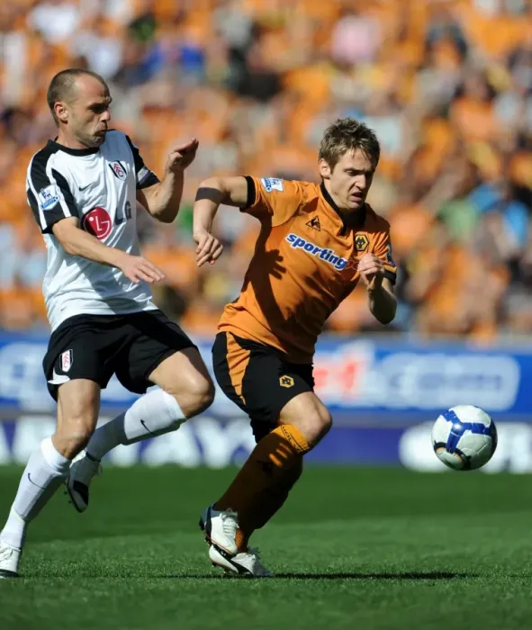 Framed Print : Clash between Kevin Doyle and Danny Murphy: A Intense Moment in Wolverhampton Wanderers vs Fulham Premier League Encounter Framed Print : Clash between Kevin Doyle and Danny Murphy: A Intense Moment in Wolverhampton Wanderers vs Fulham Premier League Encounter