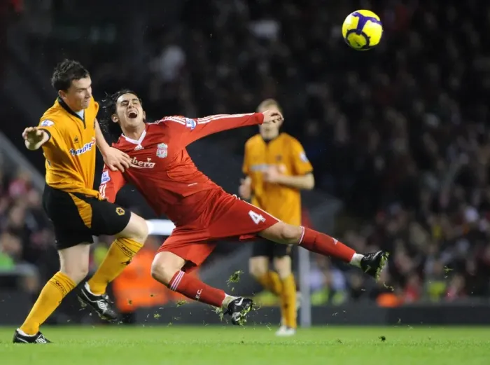 Framed Print : Clash of the Midfield: Kevin Foley vs. Alberto Aquilani - Liverpool vs. Wolverhampton Wanderers, Barclays Premier League
