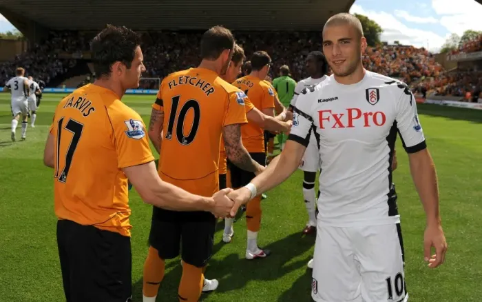 Framed Print : Clash of the Midfield Maestros: Pajtim Kasami vs Matt Jarvis in Wolverhampton Wanderers vs Fulham, Barclays Premier League Framed Print : Clash of the Midfield Maestros: Pajtim Kasami vs Matt Jarvis in Wolverhampton Wanderers vs Fulham, Barclays Premier League