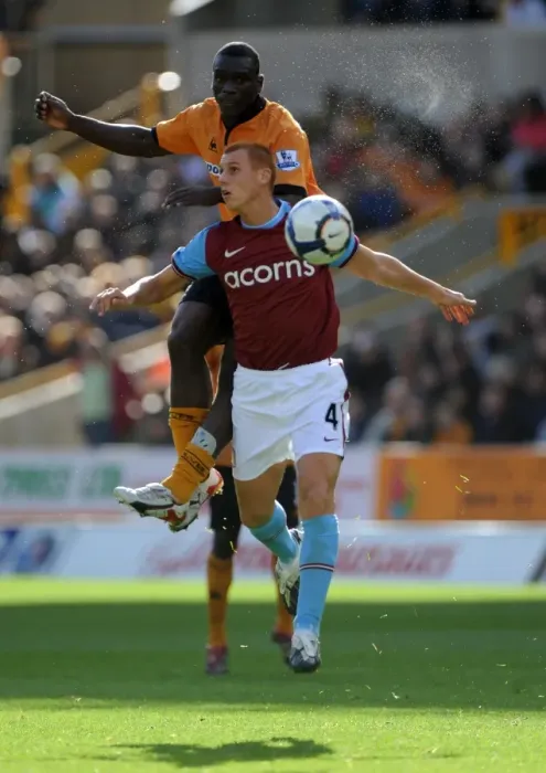 Framed Print : Clash of the Midfield: Segundo Castillo vs. Steve Sidwell in Wolverhampton Wanderers vs. Aston Villa (Premier League) Framed Print : Clash of the Midfield: Segundo Castillo vs. Steve Sidwell in Wolverhampton Wanderers vs. Aston Villa (Premier League)