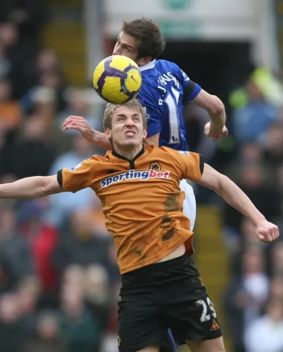 Framed Print : Clash in the Midlands: Premier League Showdown - Kevin Doyle vs. Roger Johnson Framed Print : Clash in the Midlands: Premier League Showdown - Kevin Doyle vs. Roger Johnson