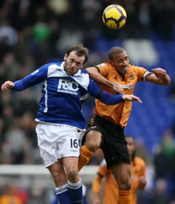 Framed Print : Clash of the Midlands: Premier League Showdown - McFadden vs. Henry: A Battle Between Birmingham City and Wolverhampton Wanderers