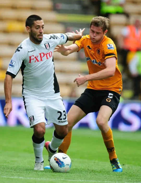 Framed Print : Clash at Molineux: Berra vs. Dempsey - A Football Rivalry Unfolds Framed Print : Clash at Molineux: Berra vs. Dempsey - A Football Rivalry Unfolds