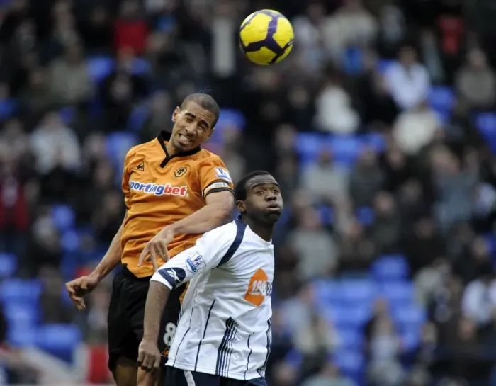 Framed Print : Clash on the Pitch: Henry vs. Muamba - Premier League Showdown: Wolverhampton Wanderers vs. Bolton Wanderers Framed Print : Clash on the Pitch: Henry vs. Muamba - Premier League Showdown: Wolverhampton Wanderers vs. Bolton Wanderers
