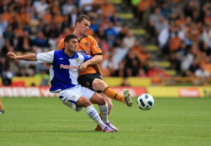 Framed Print : A Clash of Stars: Wolverhampton Wanderers Kevin Foley vs Athletic Bilbao's David Lopez