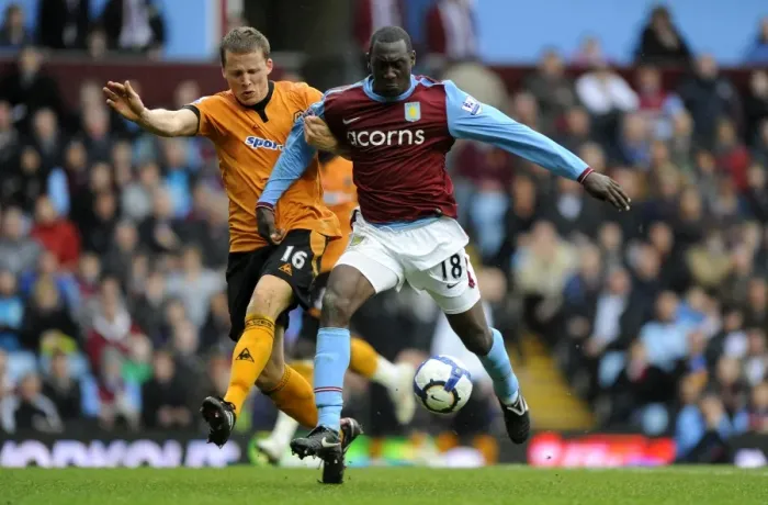 Framed Print : Clash of Titans: Berra vs. Heskey - Aston Villa vs. Wolverhampton Wanderers, Premier League Showdown Framed Print : Clash of Titans: Berra vs. Heskey - Aston Villa vs. Wolverhampton Wanderers, Premier League Showdown