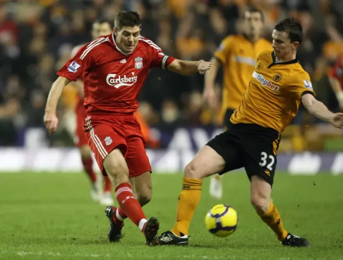 Framed Print : A Clash of Titans: Gerrard vs Foley - Wolverhampton Wanderers vs Liverpool, Barclays Premier League Soccer Framed Print : A Clash of Titans: Gerrard vs Foley - Wolverhampton Wanderers vs Liverpool, Barclays Premier League Soccer