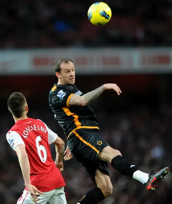 Framed Print : Clash of Titans: Steven Fletcher vs. Laurent Koscielny - Premier League Showdown Framed Print : Clash of Titans: Steven Fletcher vs. Laurent Koscielny - Premier League Showdown