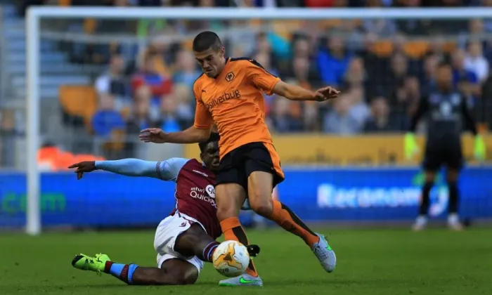 Framed Print : Conor Coady Stands Strong Against Micah Richards Challenge: Wolves vs Aston Villa Pre-Season Friendly