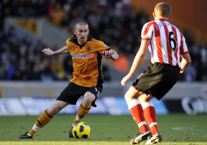 Framed Print : David Jones vs Lee Cattermole: Intense Rivalry in Wolverhampton Wanderers vs Sunderland Barclays Premier League Clash
