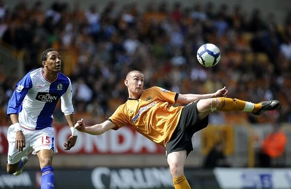 David Jones vs. Steven Nzonzi: Intense Battle in Wolverhampton Wanderers vs. Blackburn Rovers Premier League Clash