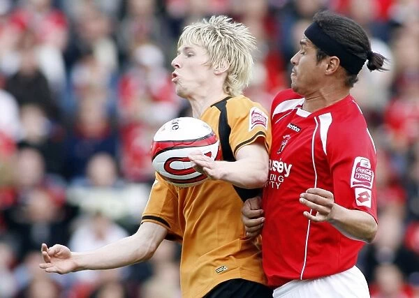 Denis Souza vs. Andrew Keogh: Championship Clash between Barnsley and Wolverhampton Wanderers, 2009