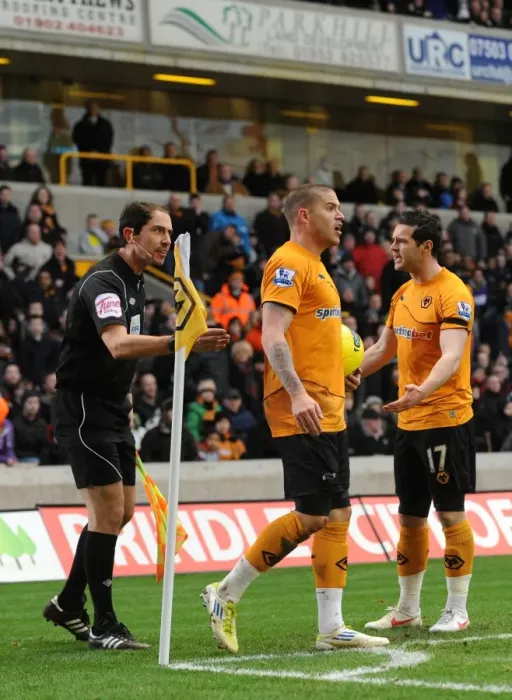 Framed Print : Disputed Quick Corner: Wolverhampton Wanderers Kightly and Jarvis Argue with Assistant Referee Framed Print : Disputed Quick Corner: Wolverhampton Wanderers Kightly and Jarvis Argue with Assistant Referee