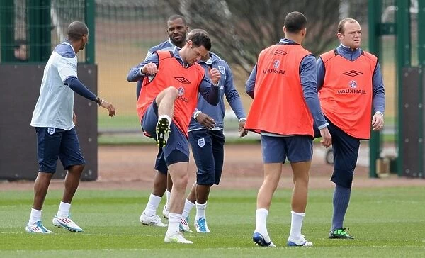 England Training Session at London Colney: Rooney and Jarvis Prepare for UEFA Euro 2012 Qualification