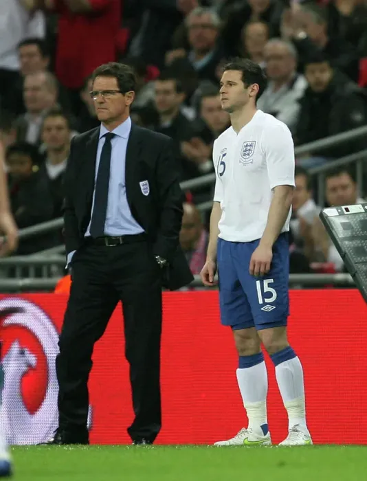 Framed Print : Fabio Capello Ponders Substitution: Matthew Jarvis of Wolverhampton Wanderers Ready to Enter the Field for England
