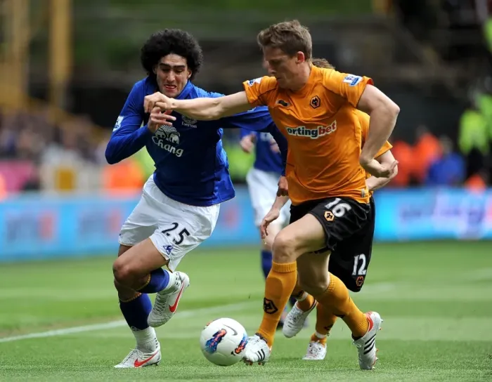 Framed Print : Fellaini vs Berra: A Football Rivalry's Intense Battle for Ball Supremacy - Wolverhampton Wanderers vs Everton Framed Print : Fellaini vs Berra: A Football Rivalry's Intense Battle for Ball Supremacy - Wolverhampton Wanderers vs Everton