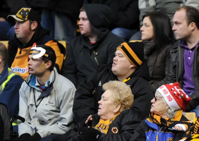 Framed Print : A Festive Showdown: Wolverhampton Wanderers vs Birmingham City - Woman in Santa Hat Framed Print : A Festive Showdown: Wolverhampton Wanderers vs Birmingham City - Woman in Santa Hat
