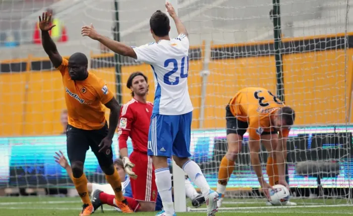 Framed Print : George Elokobi Scores the Opener for Wolverhampton Wanderers Against Real Zaragoza Framed Print : George Elokobi Scores the Opener for Wolverhampton Wanderers Against Real Zaragoza
