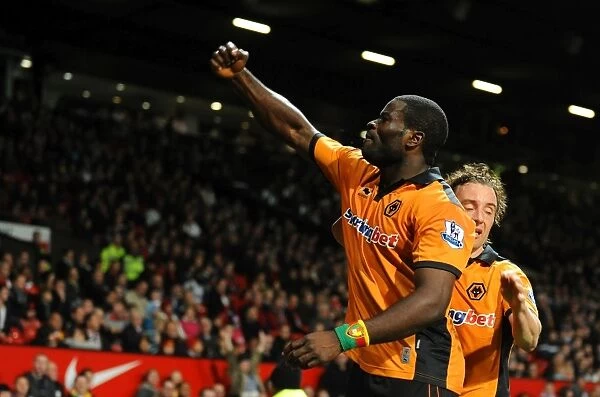 George Elokobi of Wolverhampton Wanderers celebrates after scoring to make it 1-1
