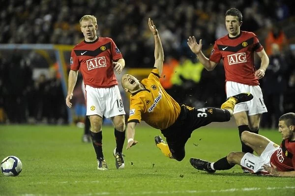 Intense Barclays Premier League Clash: Guedioura Fouls Vidic (Wolverhampton Wanderers vs Manchester United, 2010)
